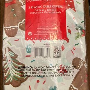 New sealed Gingerbread Man two pack table covers